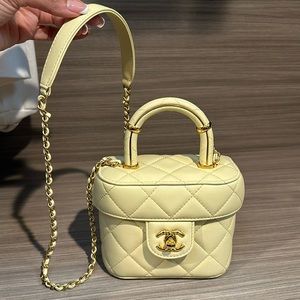 Chanel yellow handle bag